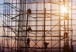 Construction Workers Working on a Building